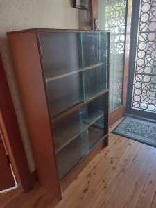 Display cabinet with glass sliding doors
