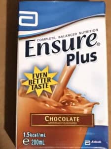 Ensure Plus high-protein milkshake nutritional supplement. Chocolate.