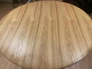 Circular dining table with separate glass top
