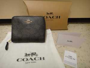 BRAND NEW Coach Black/Brown Zippy Wallet (authentic) $150
