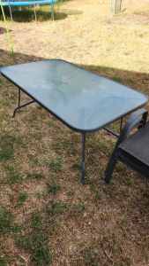 6 seater glass table and chairs 