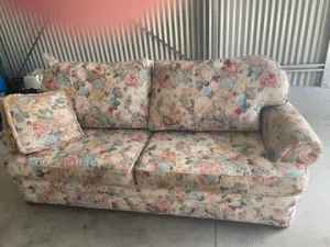 Floral Patterned couch with couch bed included 