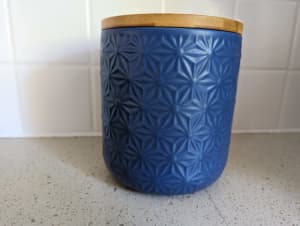Dusty blue kitchen cannister with bamboo lid