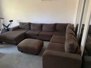 Large brown sectional lounge