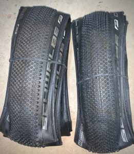 Brand New. Pair of Schwalbe Performance Line G One Gravel Tyres.