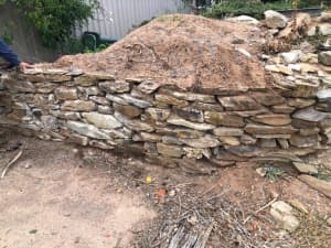 Natural stone retaining wall. Dry wall