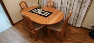 Dining table and 4 chairs, very good condition.