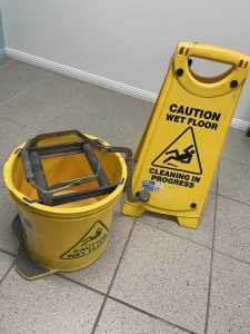 Wet floor hazard sign, bucket and mop $20