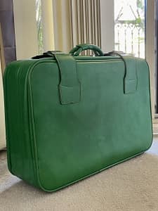 Green vintage suitcase