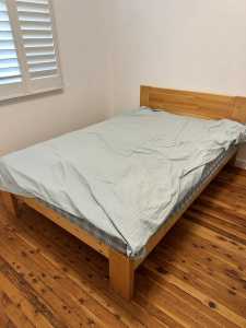 Solid wooded bed with latex mattress