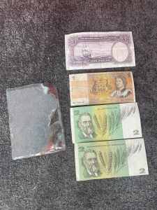 New Zealand and Australian $1 and $2 notes complete with case