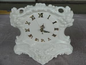 white ceramic hand made mantel clock