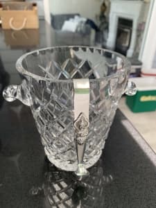 Silver tongue and crystal ice bucket
