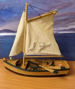 Miniature Wood Sailing/Row Boat with oars 22cm L x 23 H x 8cm W.