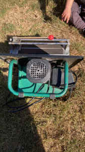 Tile cutters 1 electric 1 not $30 for both 