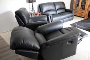 Leather Lounge Suite which includes 2 Recliners. Near new.