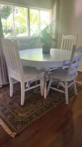 Vintage round refurbished extendable table and chairs set.