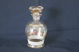Vintage glass decanter with gold trim. No chips or cracks.
