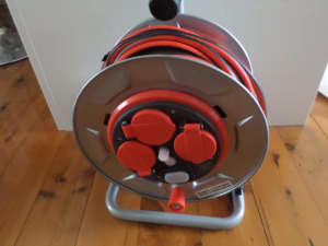 25 metre IP44 Heavy duty steel cable reel with 3 sockets.15Amp