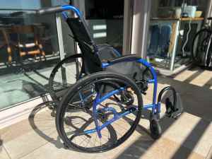 Self-propelled wheelchair (Strongback 24) in excellent condition