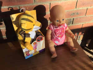 Doll and Childs Backpack and Braz Doll in good condition 