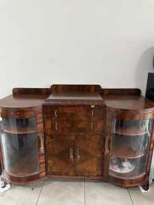 Chine cabinet with curved glass doors.