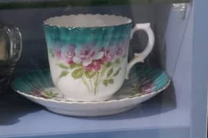 Cup and saucer. Mustache cup