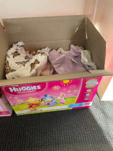 Box full of baby girls 0000 clothes