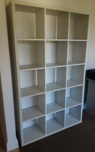 Price dropped! hite solid wood 15 cube wall unit. Excellent condition.