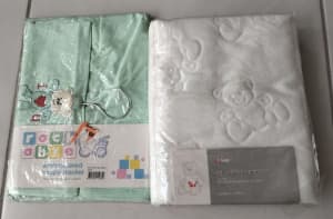 Brand new Nappy stacker and cot mattress protector