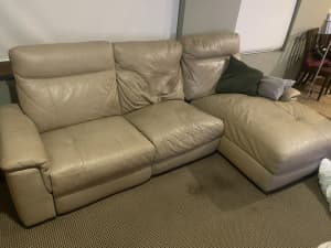 Free couch. Leather three seater chaise with electric recliner.