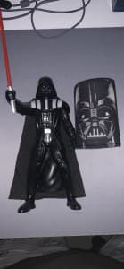 Darth Vader figure includes a stubby holder and vaders red light saber