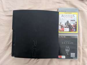 PS3 w/ Skyrim & Assassins Creed 2