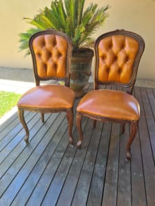 2 French Provincial Louis XV chesterfield leather chairs