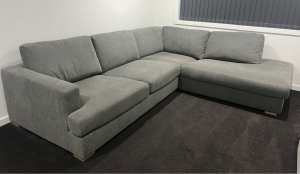 Living room light grey sofa. 