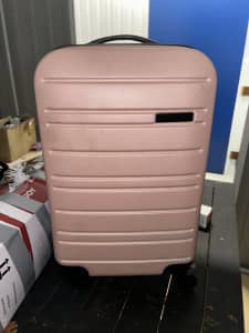 Hard covered suite case on wheels