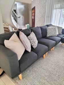 5 seater couch with a side poof 