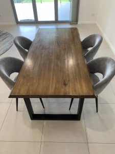wooden dining table and 4 chairs