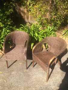 A Pair of Vintage Cane Wicker Outdoor Patio Armchairs