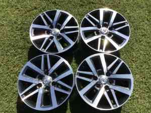 Four 18 Toyota Hilux wheels with 6x139.7 stud pattern.