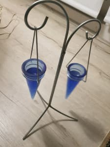 2 candle stand .blue glass