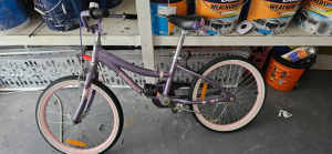 Kids purple cruiser bike