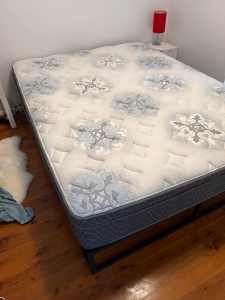 Basic but comfortable queen size bed base and mattress
