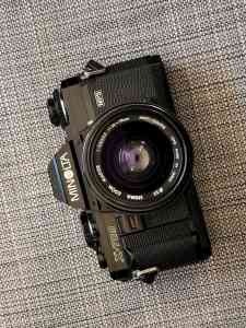 Minolta X700 with 35-70mm Zoom Lens