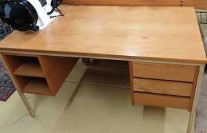 Steel framed desk with three drawers