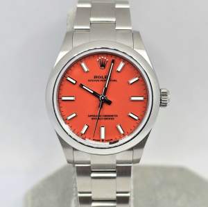 Rolex Oyster Perpetual 31 277200 Coral Red GST INC