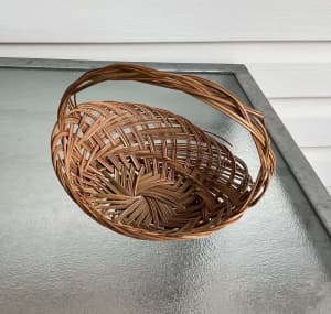 SMALL OVAL CANE BASKET WITH HANDLE