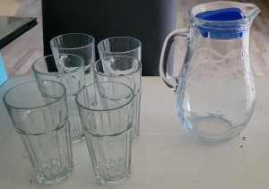 6 glasses and a glass jug 
