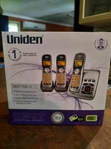 Uniden DECT1735 home phone set with 6 handsets. 
