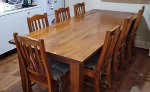 Solid timber dining table and chairs
